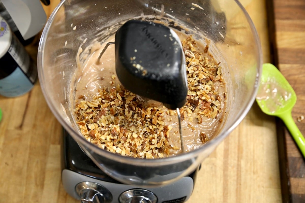 Mixer bowl with walnut loaf batter.