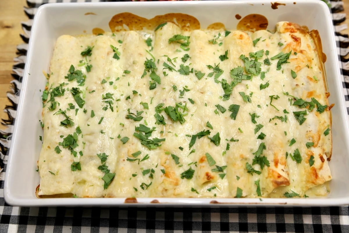 Pan of enchiladas topped with cilantro.