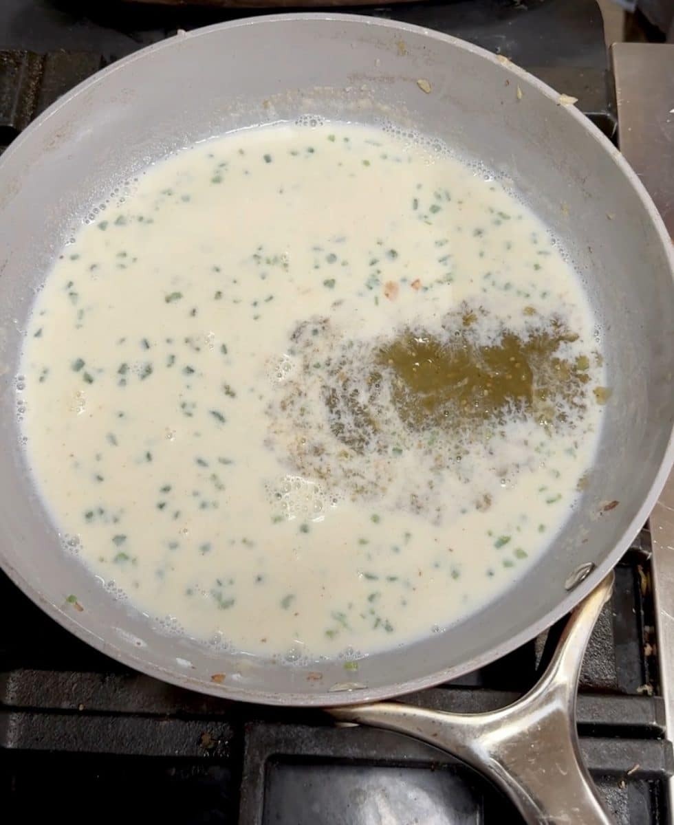 Making creamy enchilada sauce with salsa verde.