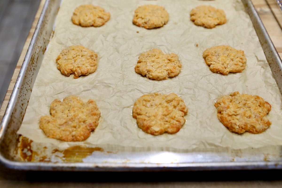 Cheese wafers baked on cookie sheet.
