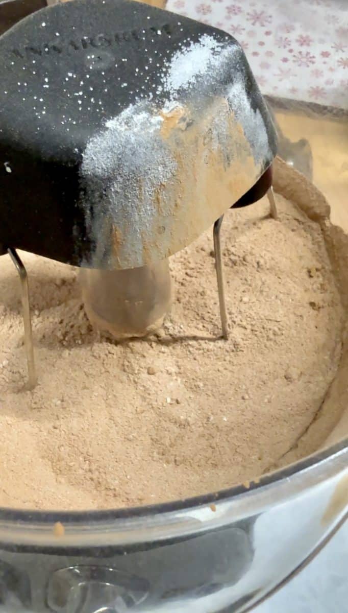 Making chocolate cake in a mixer.