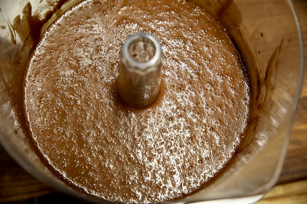 Cake batter in a mixer bowl.