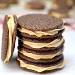 Soft chocolate sandwich cookies with caramel filling - stacked.