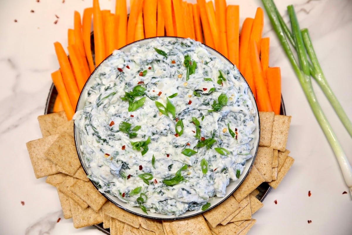 Spinach Dip with carrots, crackers.