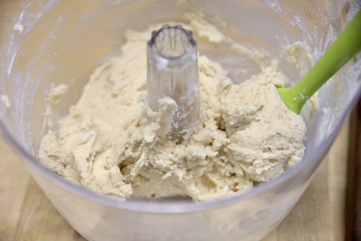 Cookie Dough in a bowl with spatula.