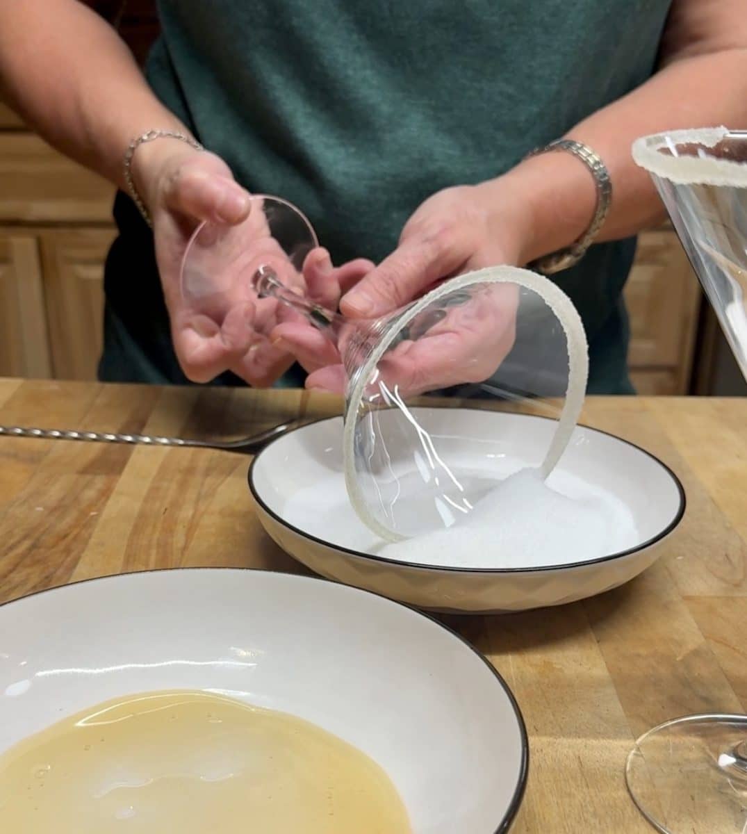 Making a sugar rim garnish for martini glass.