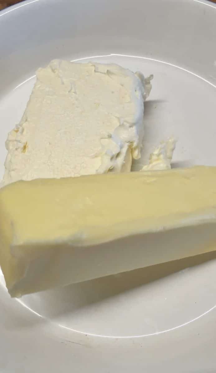 Bowl with cream cheese and butter.
