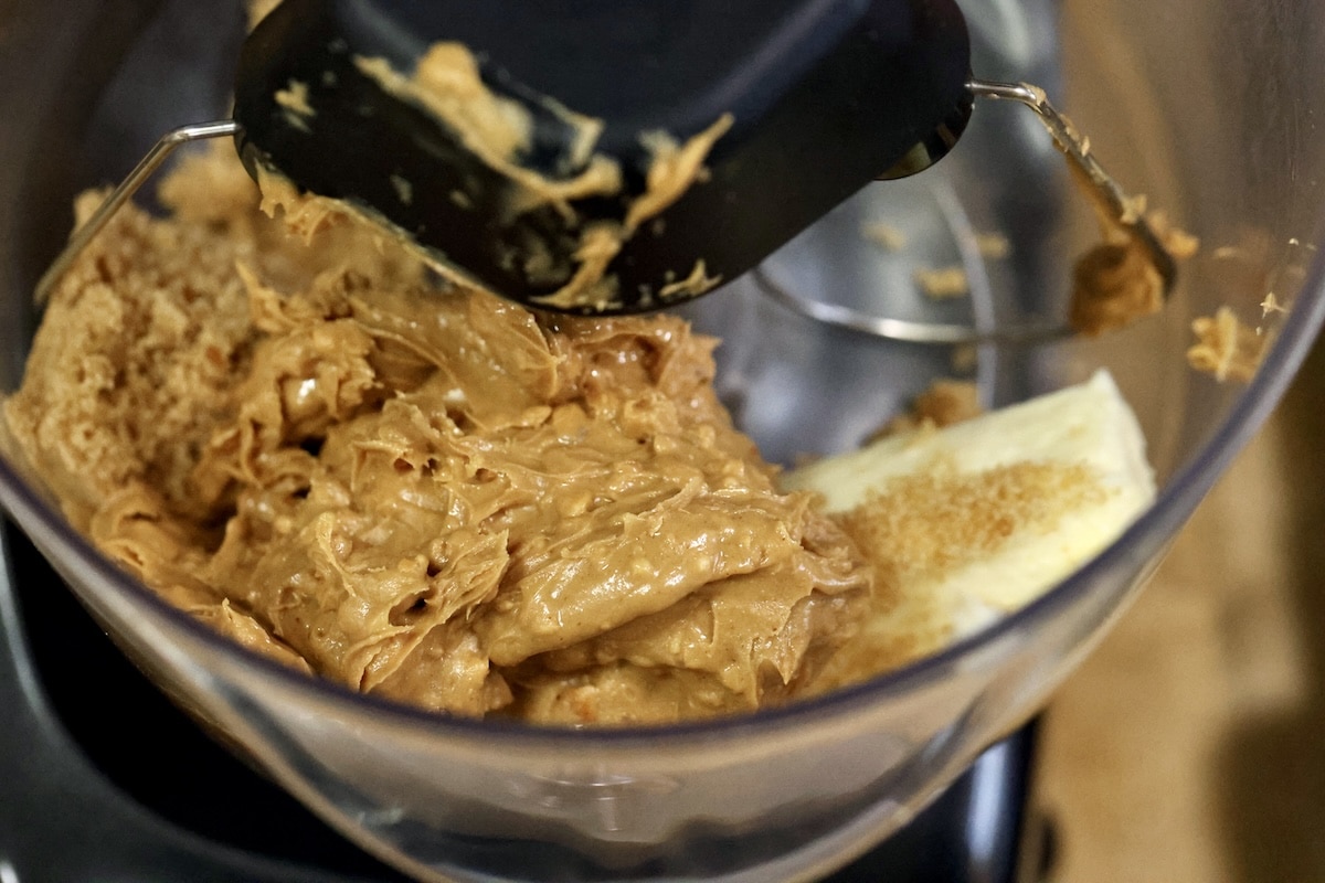 Mixer bowl with butter and peanut butter.