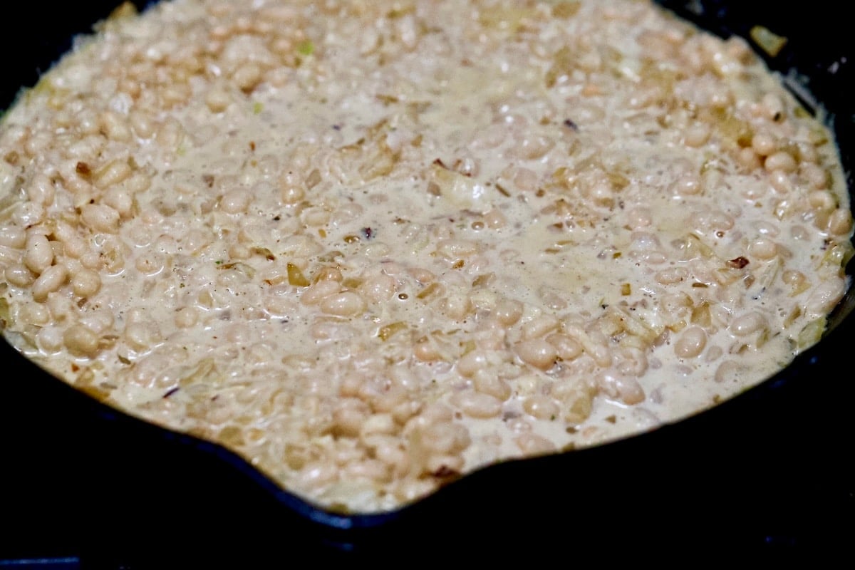 White beans in creamy parmesan sauce.