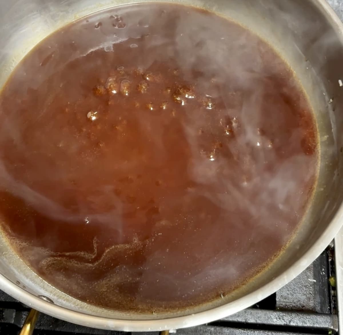 Simmering sesame sauce for Asian noodles.