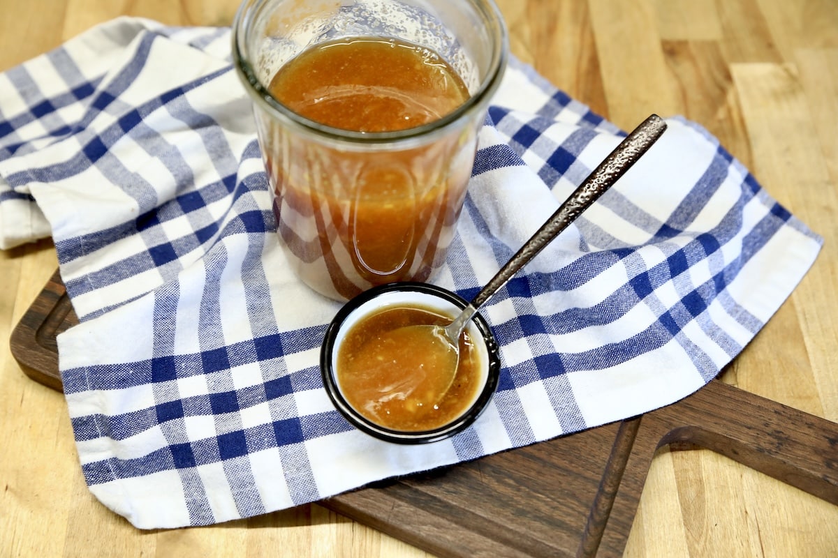 Orange sauce in a jar.