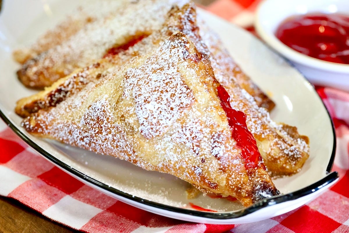 Strawberry turnovers with powdered sugar. 