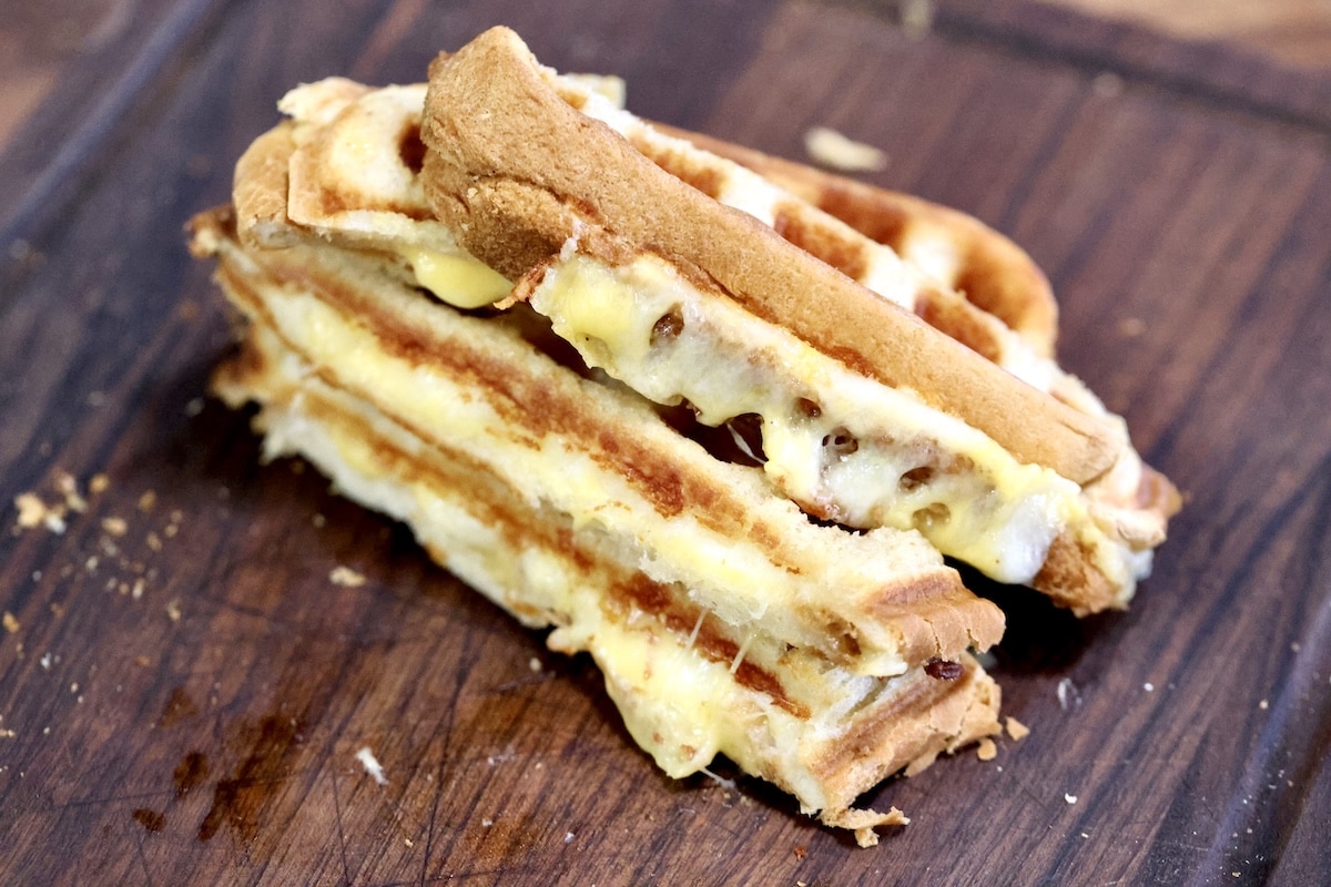 Sliced grilled cheese waffle. 