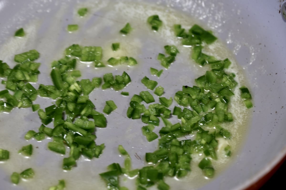 DIced jalapeno in butter.