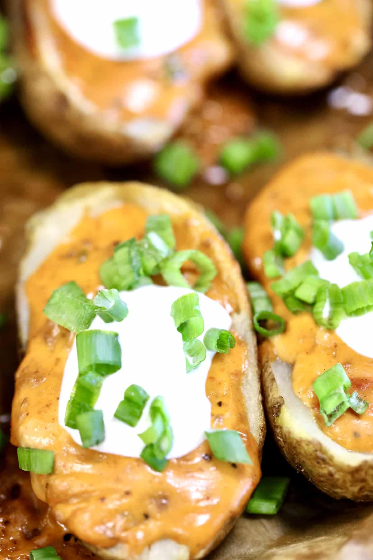 Chili Cheese loaded potato skins. Chili cheese potato skins appetizer.
