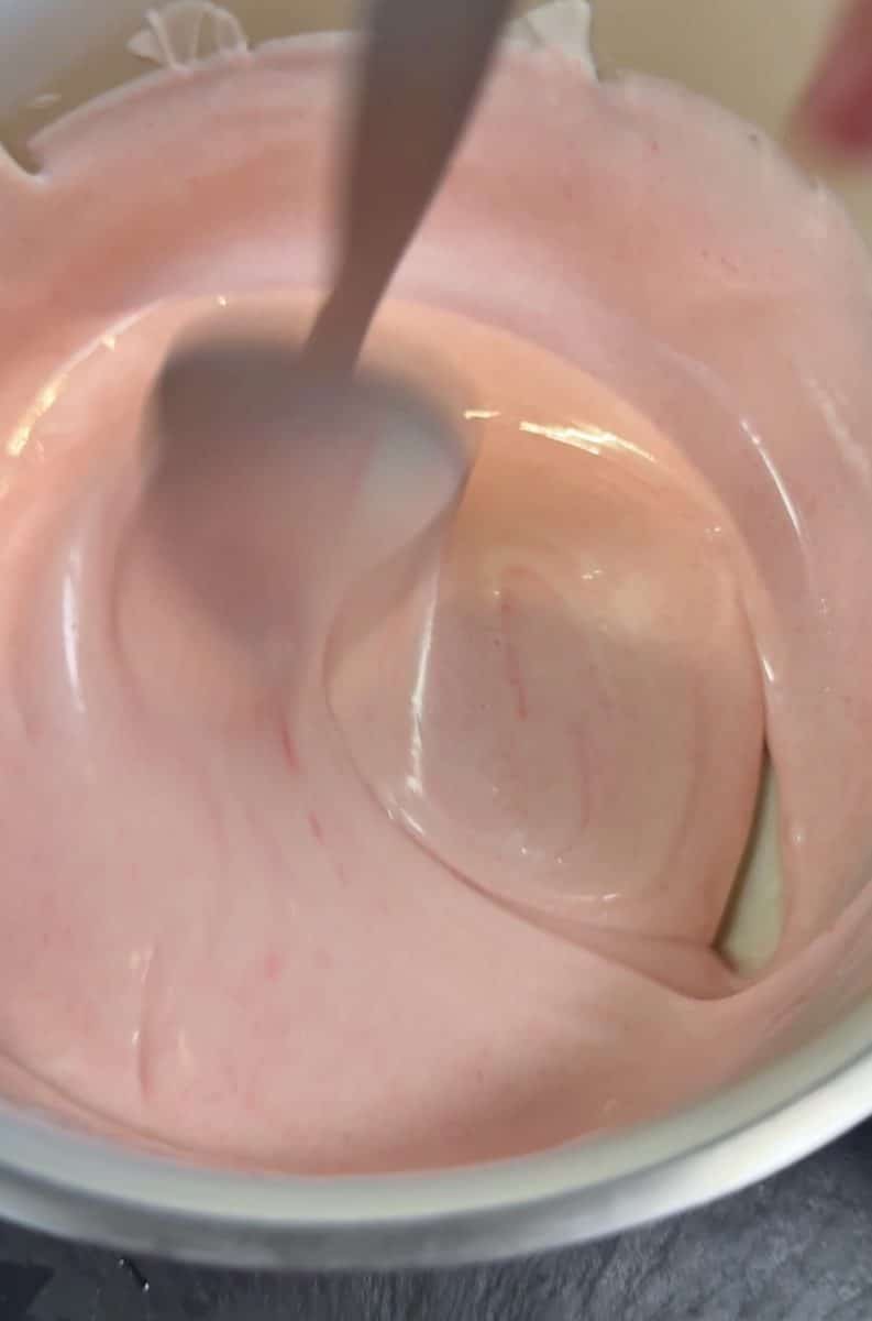 Pink white chocolate coating for cake balls.