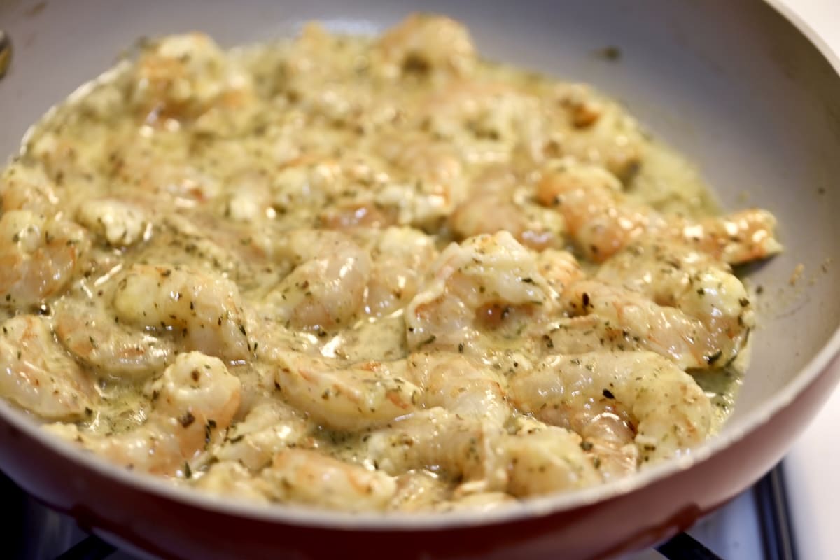 Cooking shrimp in a skillet.