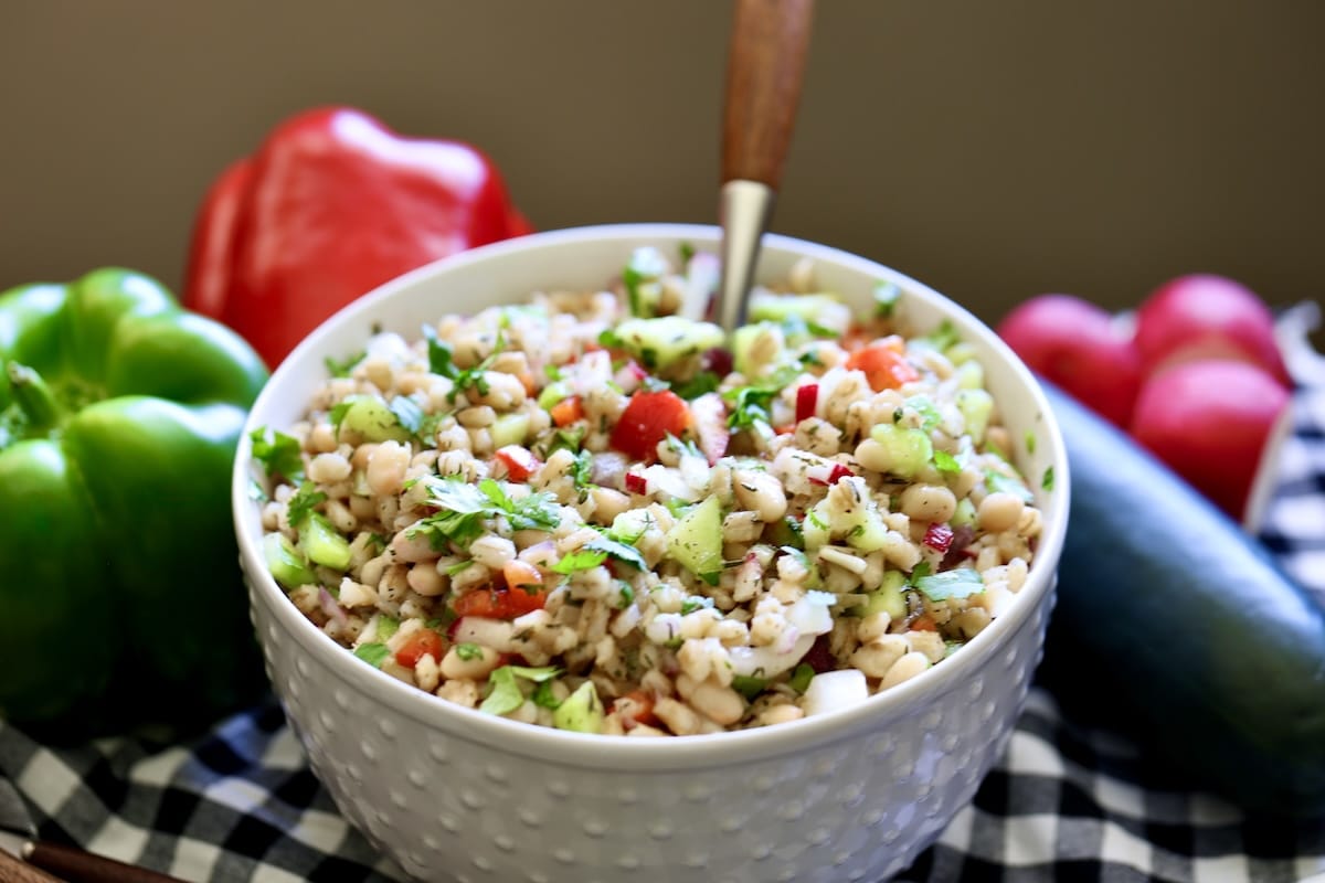 Barley salad with vegetables and white beans.