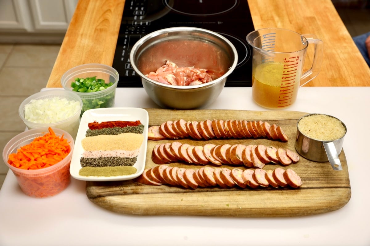 Ingredients for smoked sausage chicken and rice casserole.