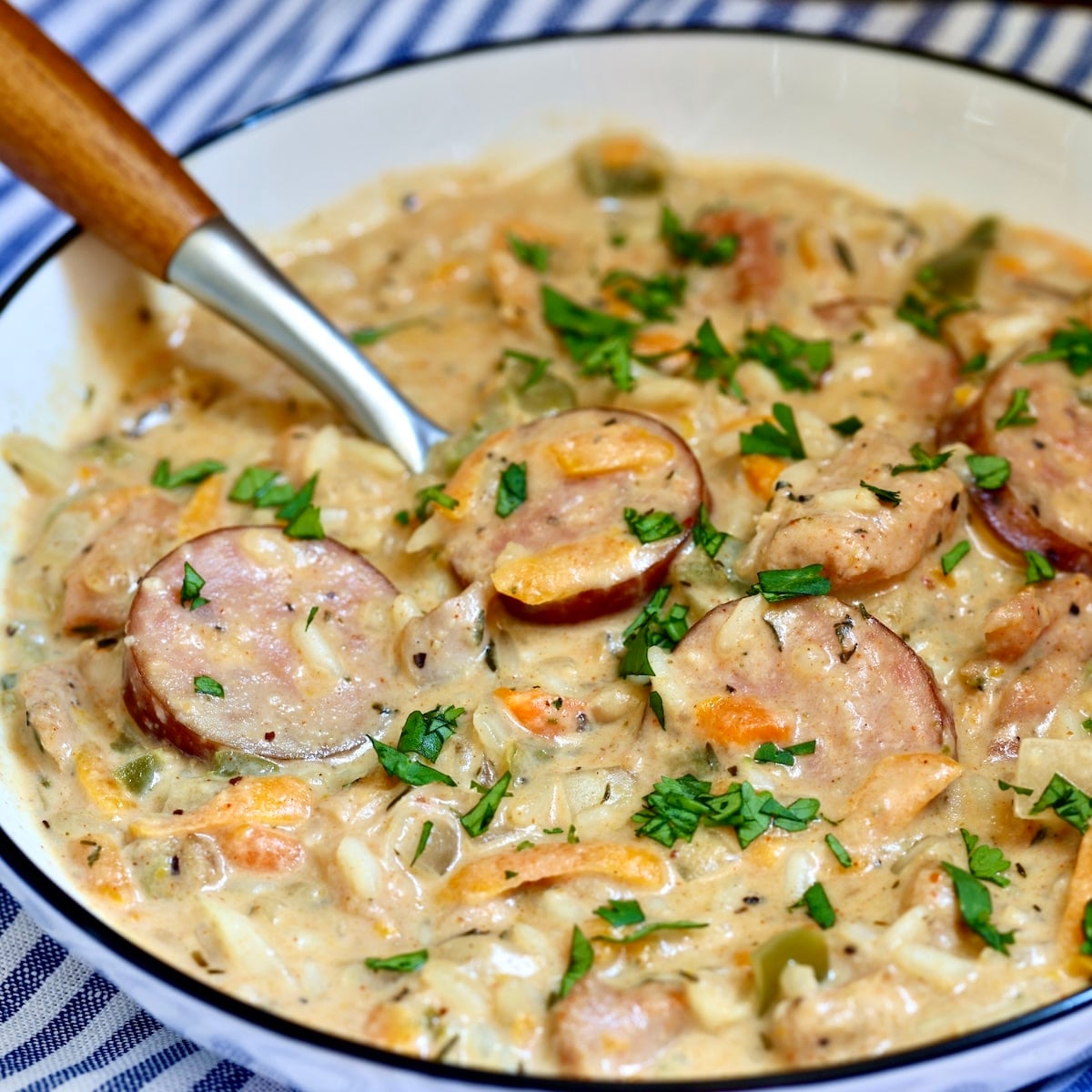Bowl of smoked sausage chicken and rice.