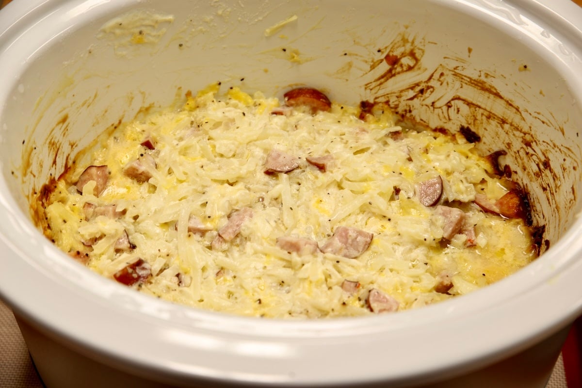 Hashbrown smoked sausage casserole in a crock pot.